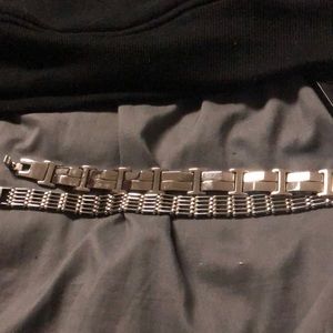 Two silver men’s bracelets